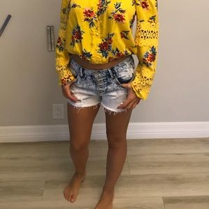 Destroyed light blue shorts